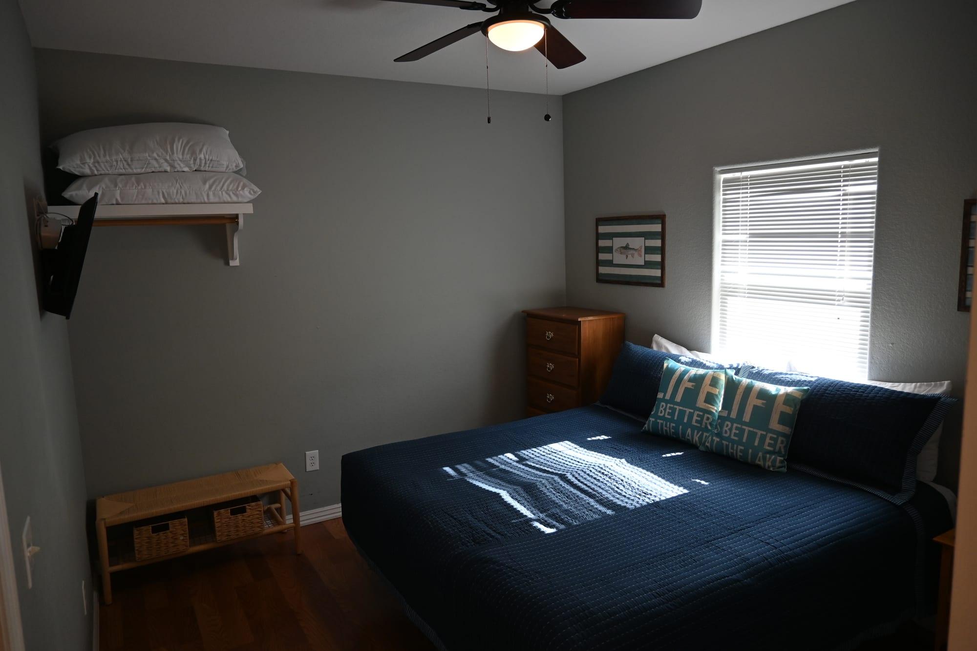 Primary bedroom with king bed in Suite 1